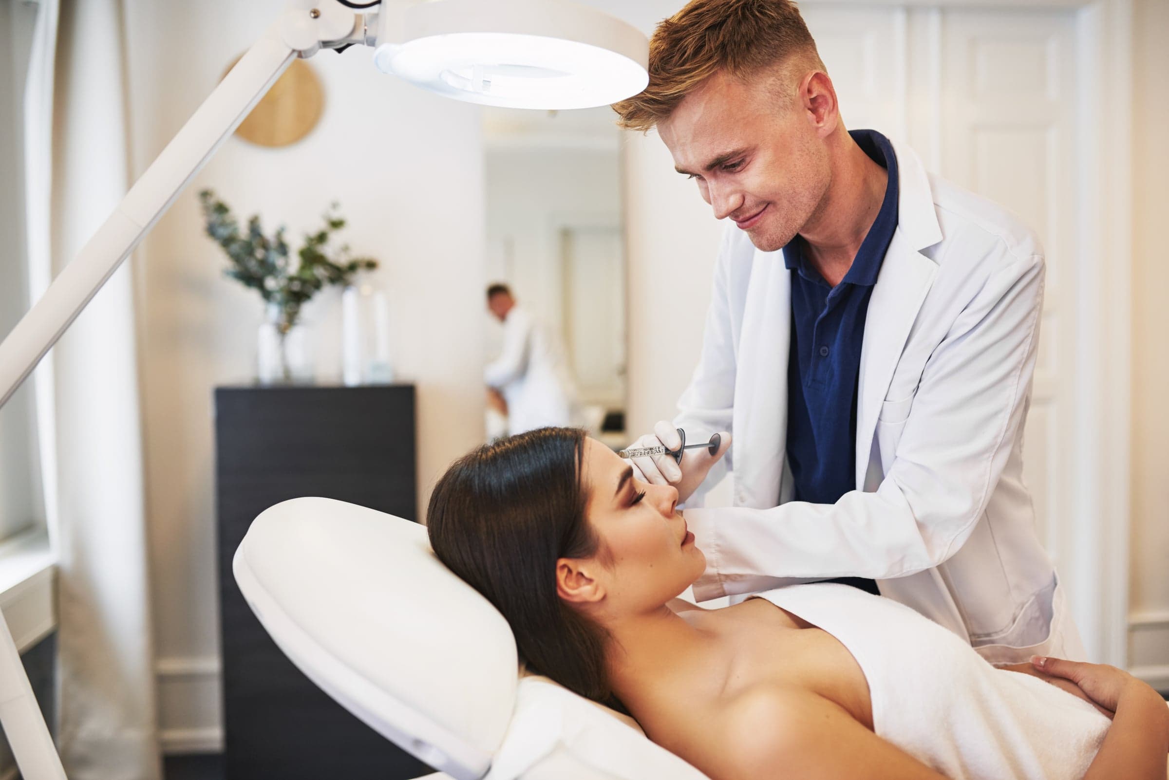 Aesthology provider performing a luxury medspa treatment