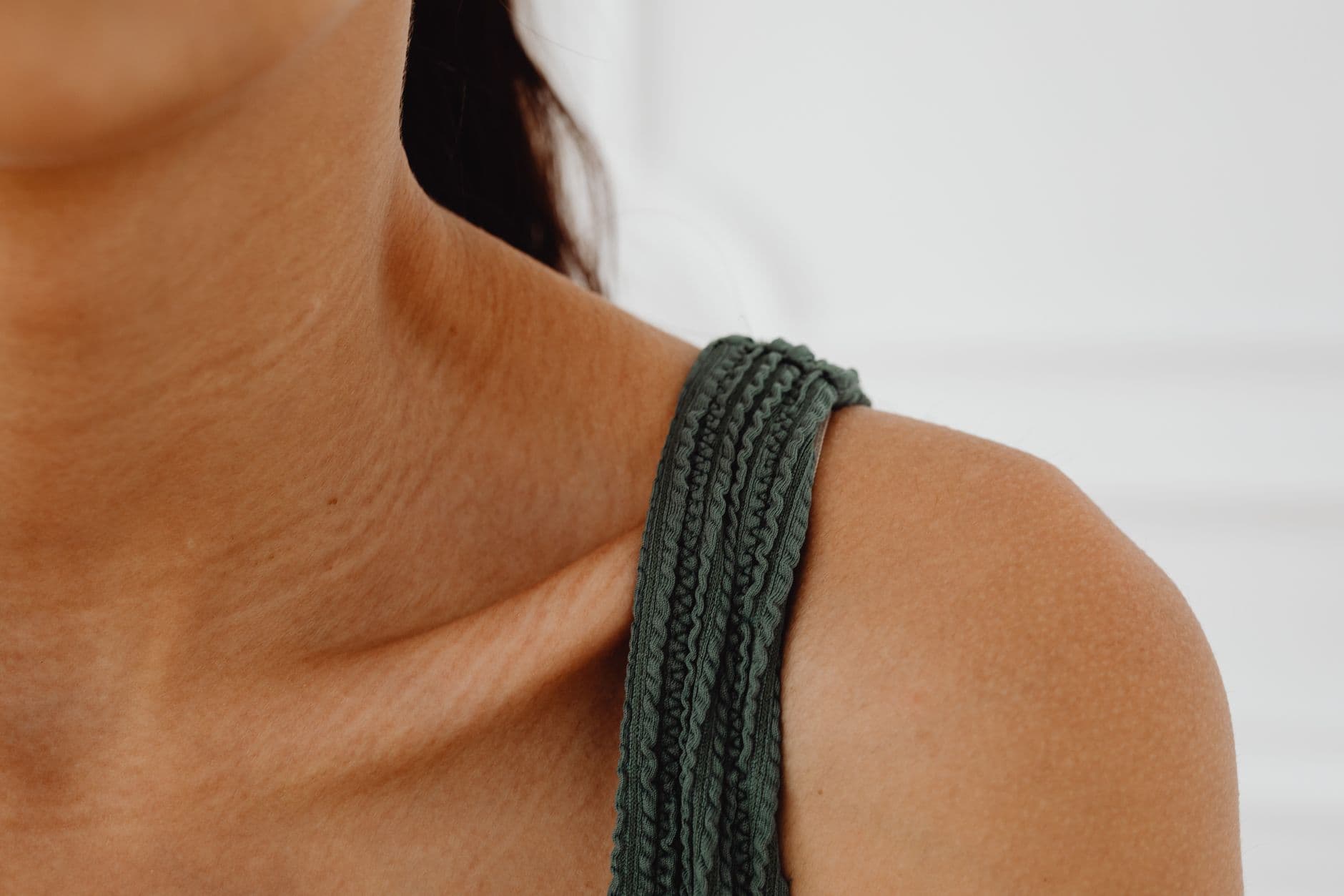 A woman considering an arm lift
