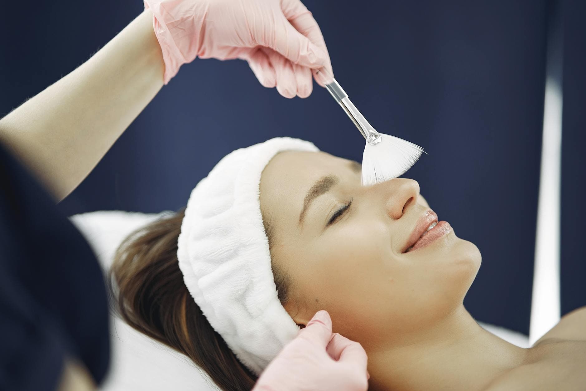 A patient enjoying a wellness treatment at Aesthology Medspa
