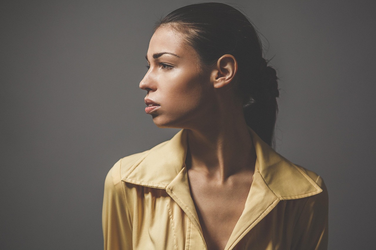 Close-up of a defined jawline in soft studio lighting